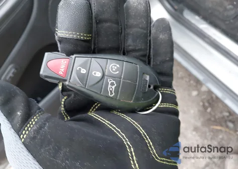 2012 Jeep Grand Cherokee Overland из США, поврежденный, VIN 1C4RJFCTXCC133543